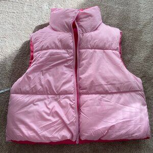 Only reversible pink puffer vest - (size L)